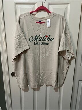Malibu Beige Graphic Tee with Dark Green Logo